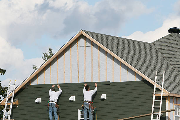 Professional Siding Contractor technician working in Utica, PA